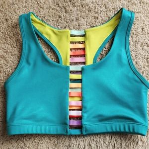 ZUMBA turquoise/teal rainbow ladder sports bra. Fitz 34B. I think Medium :)